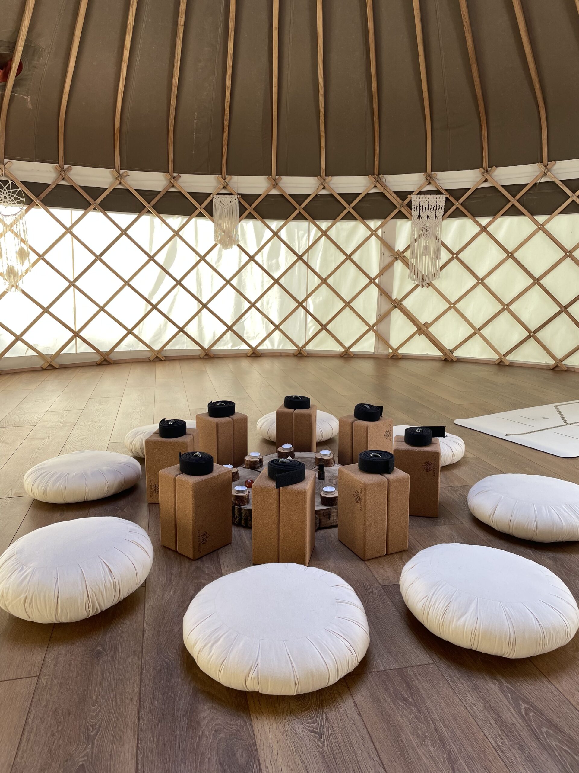 Yurt set up for yoga with props